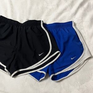 two pairs of nike shorts